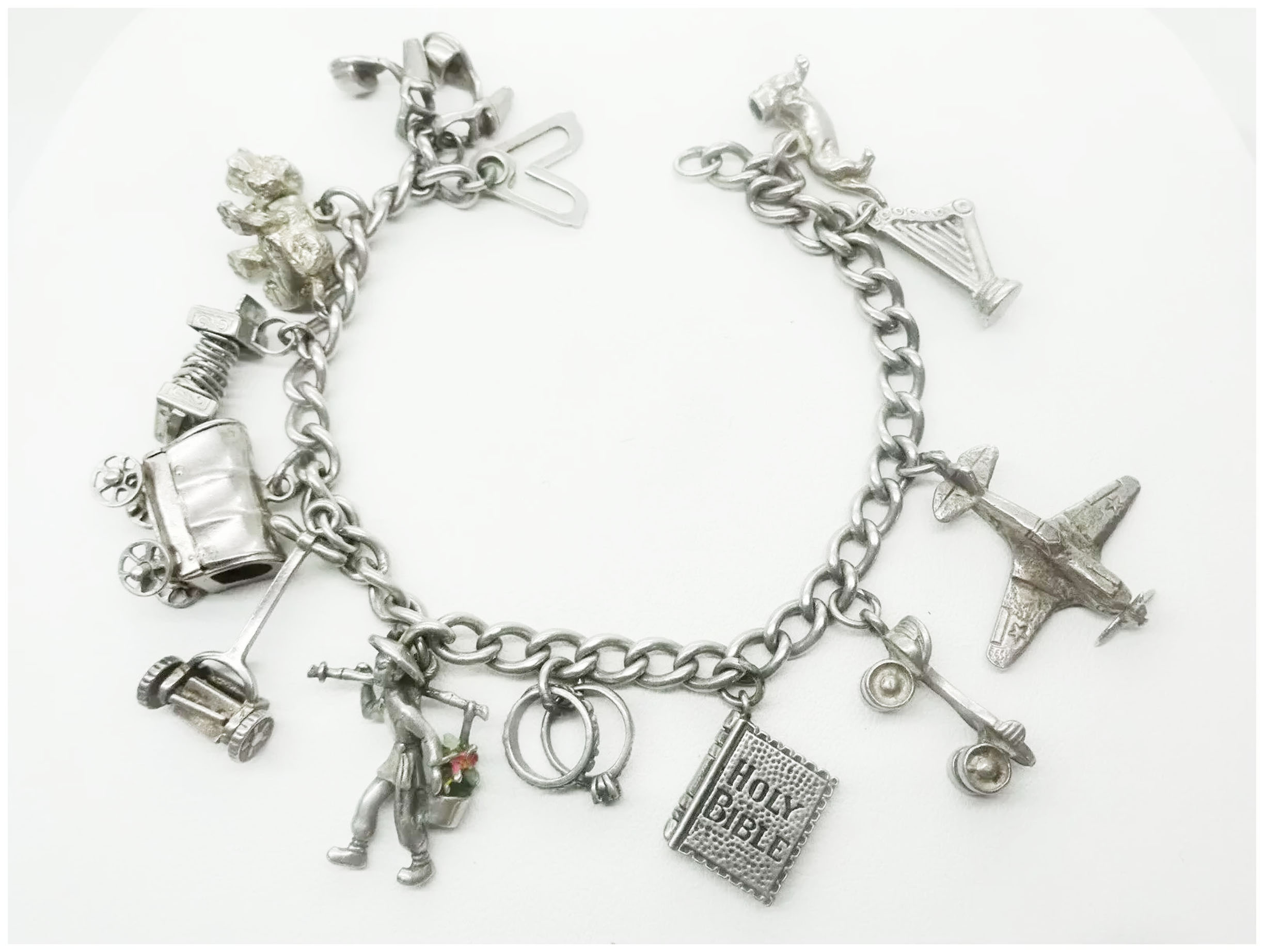 Unique Sterling Silver Charm Bracelet with 27 Charms